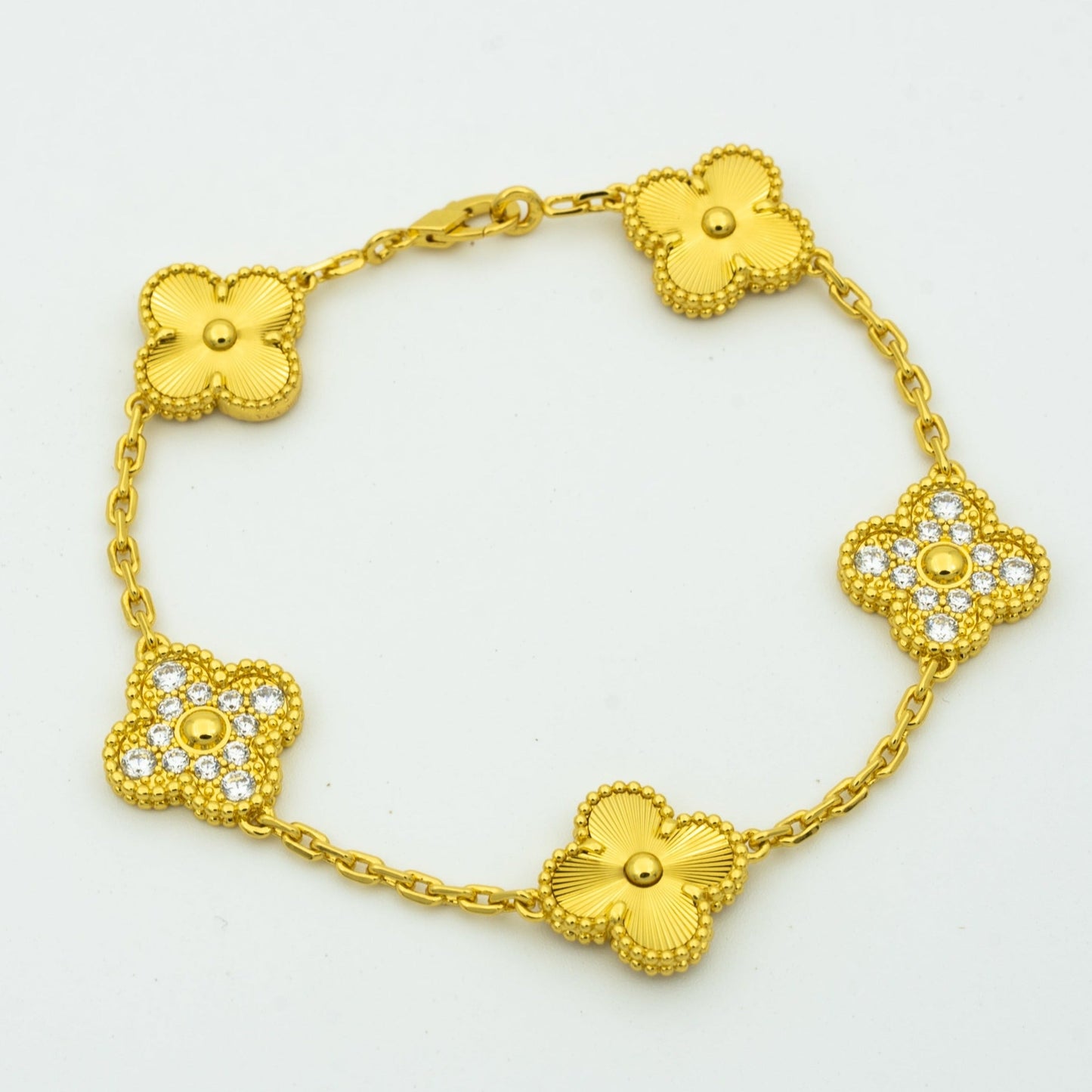 [RAFFINE]PULSERA TRÉBOL 5 MOTIVOS ORO DIAMANTE