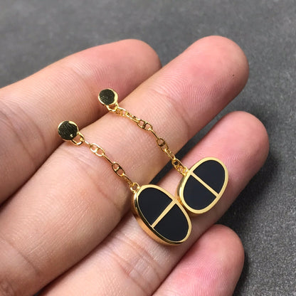 [RAFFINE] PENDIENTES DE PLATA Y CERÁMICA NEGRA VERSO