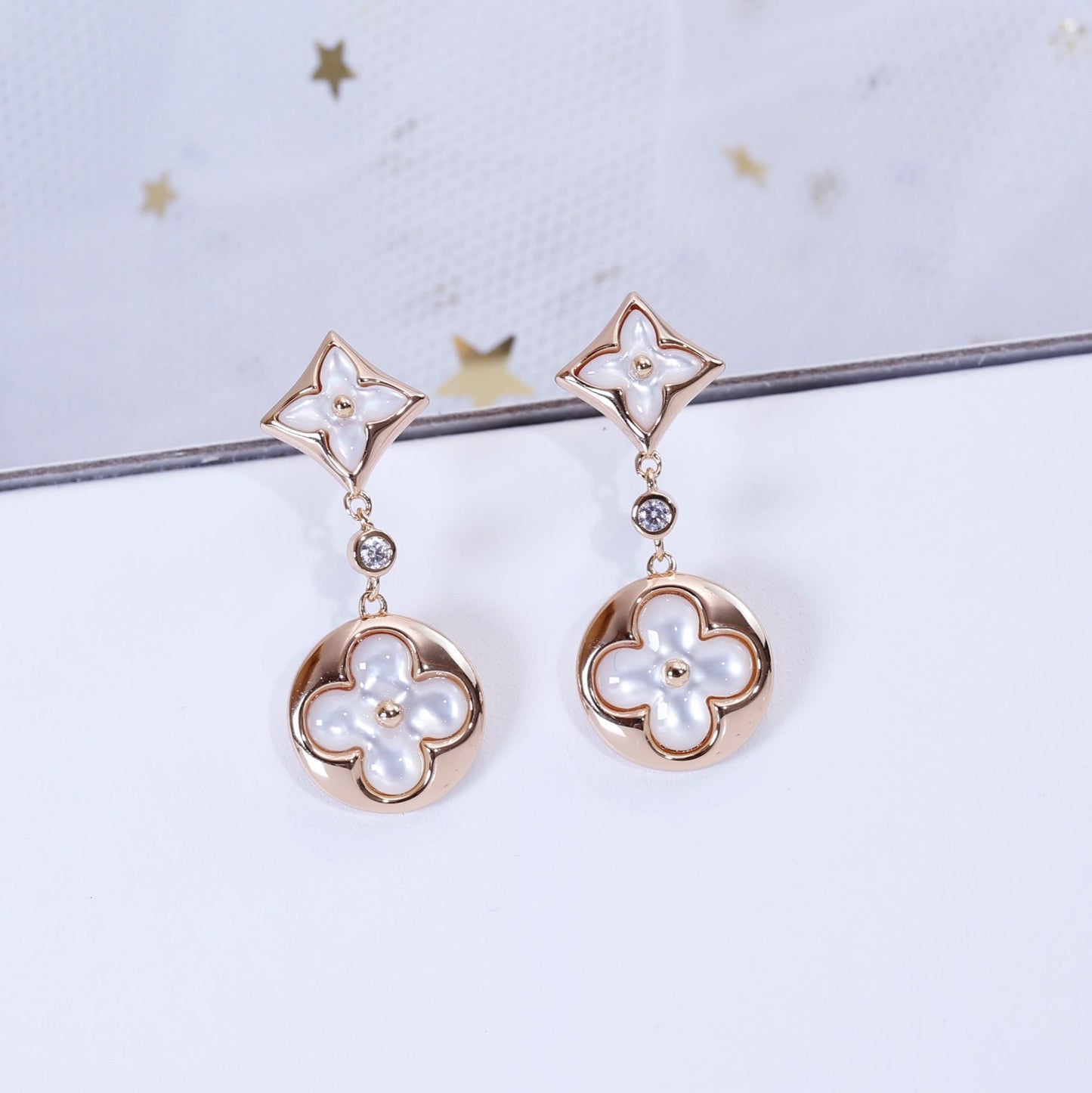 [RAFFINE] PENDIENTES DE LONGITUD DE TRAPEZOIDAL DE ORO ROSA CON ESTRELLA Y SOL