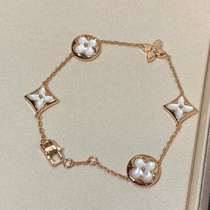 [RAFFINE]STAR AND SUN 5 MOTIF MOP PINK GOLD BRACELET
