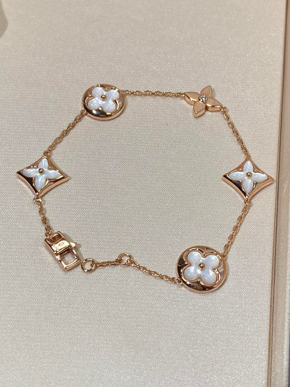 [RAFFINE]STAR AND SUN 5 MOTIF MOP PINK GOLD BRACELET