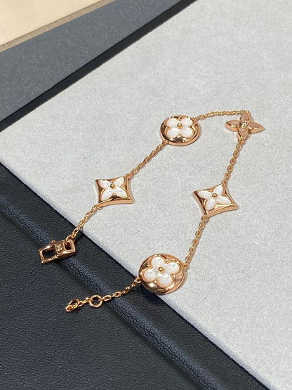 [RAFFINE]STAR AND SUN 5 MOTIF MOP PINK GOLD BRACELET