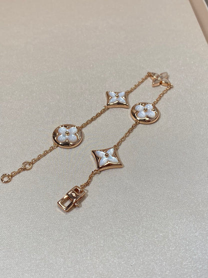 [RAFFINE]STAR AND SUN 5 MOTIF MOP PINK GOLD BRACELET