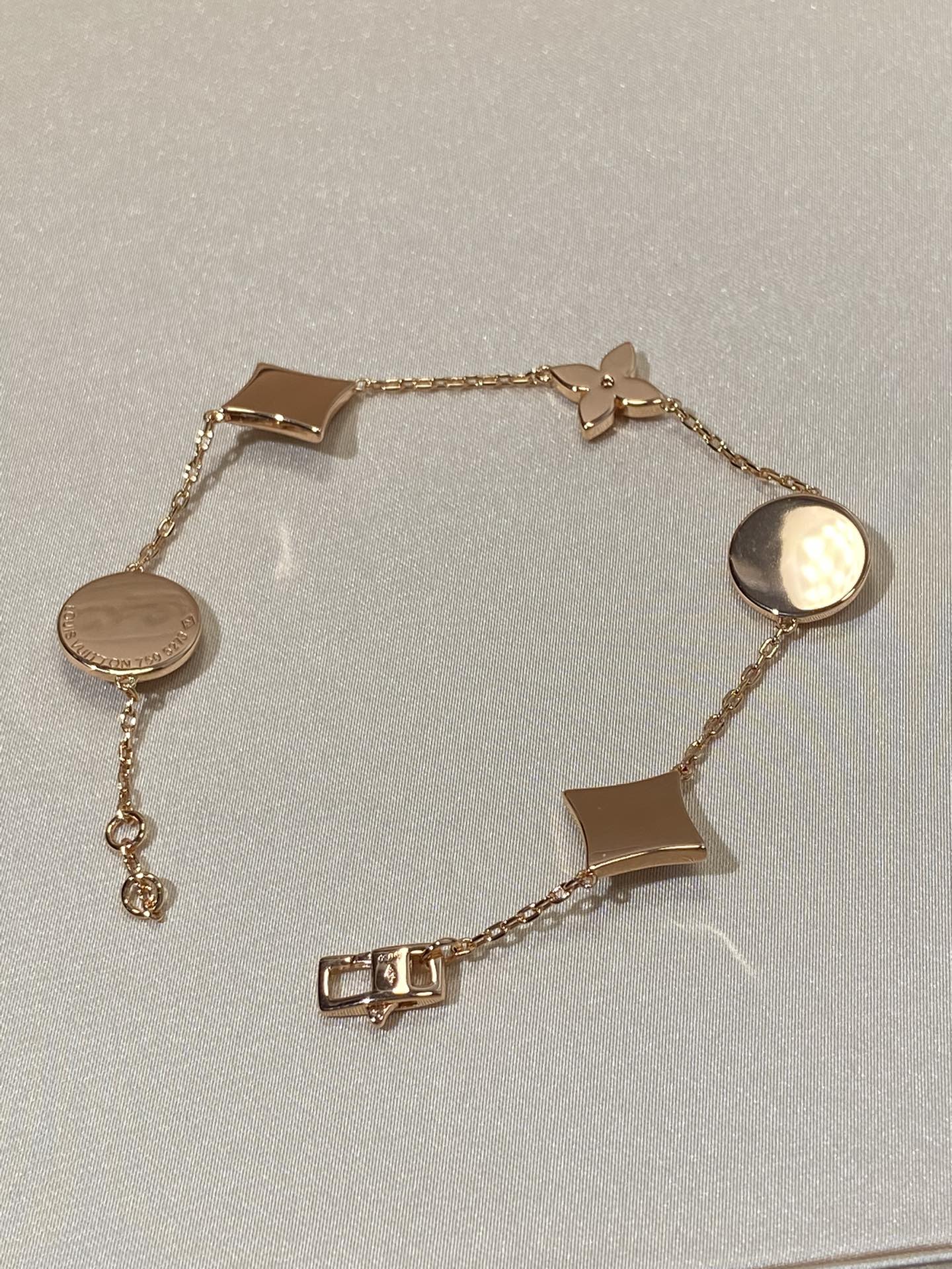 [RAFFINE]STAR AND SUN 5 MOTIF MOP PINK GOLD BRACELET