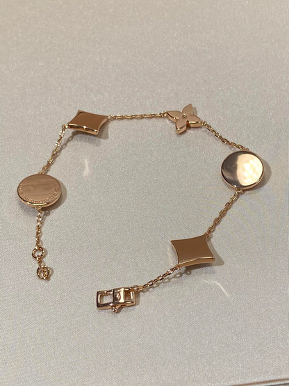 [RAFFINE]STAR AND SUN 5 MOTIF MOP PINK GOLD BRACELET