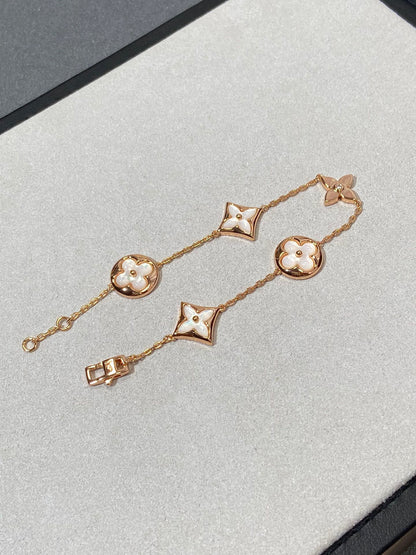 [RAFFINE]STAR AND SUN 5 MOTIF MOP PINK GOLD BRACELET
