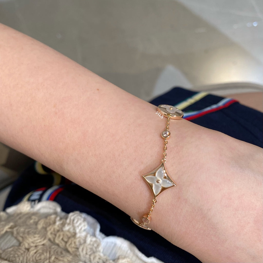 [RAFFINE]STAR AND SUN 4 MOTIF WHITE MOP PINK GOLD BRACELET