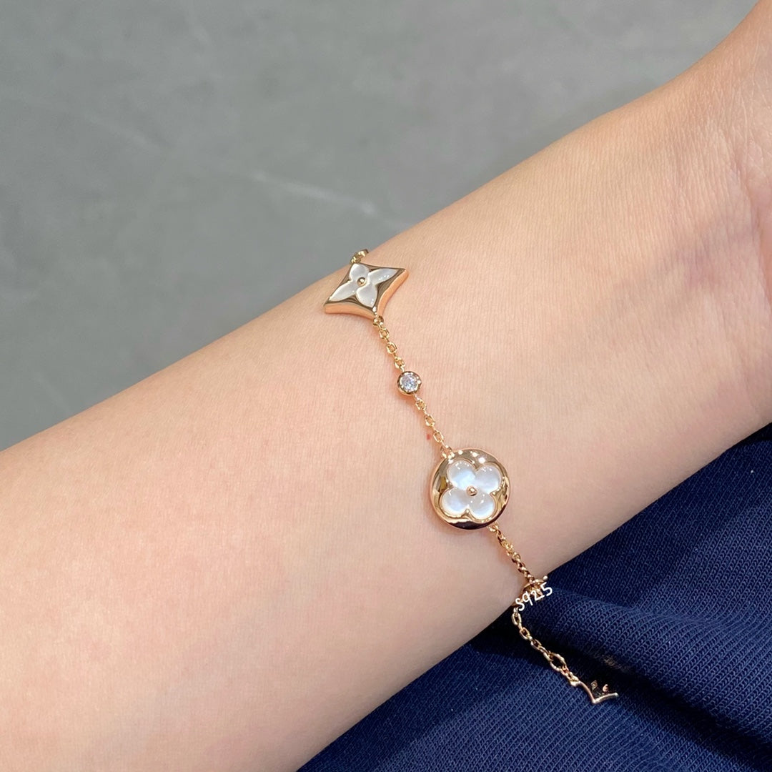 [RAFFINE]STAR AND SUN 4 MOTIF WHITE MOP PINK GOLD BRACELET