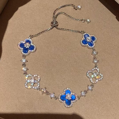 [RAFFINE] PULSERA CON 5 MOTIVOS DE TRÉBOL ROSA AZUL ROJO BLANCO 