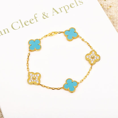 [RAFFINE] PULSERA DE ORO CON 5 MOTIVOS DE TRÉBOL, TURQUESA Y DIAMANTE