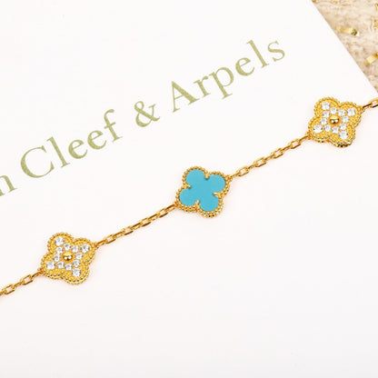 [RAFFINE] PULSERA DE ORO CON 5 MOTIVOS DE TRÉBOL, TURQUESA Y DIAMANTE