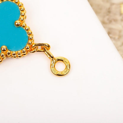 [RAFFINE] PULSERA DE ORO CON 5 MOTIVOS DE TRÉBOL, TURQUESA Y DIAMANTE