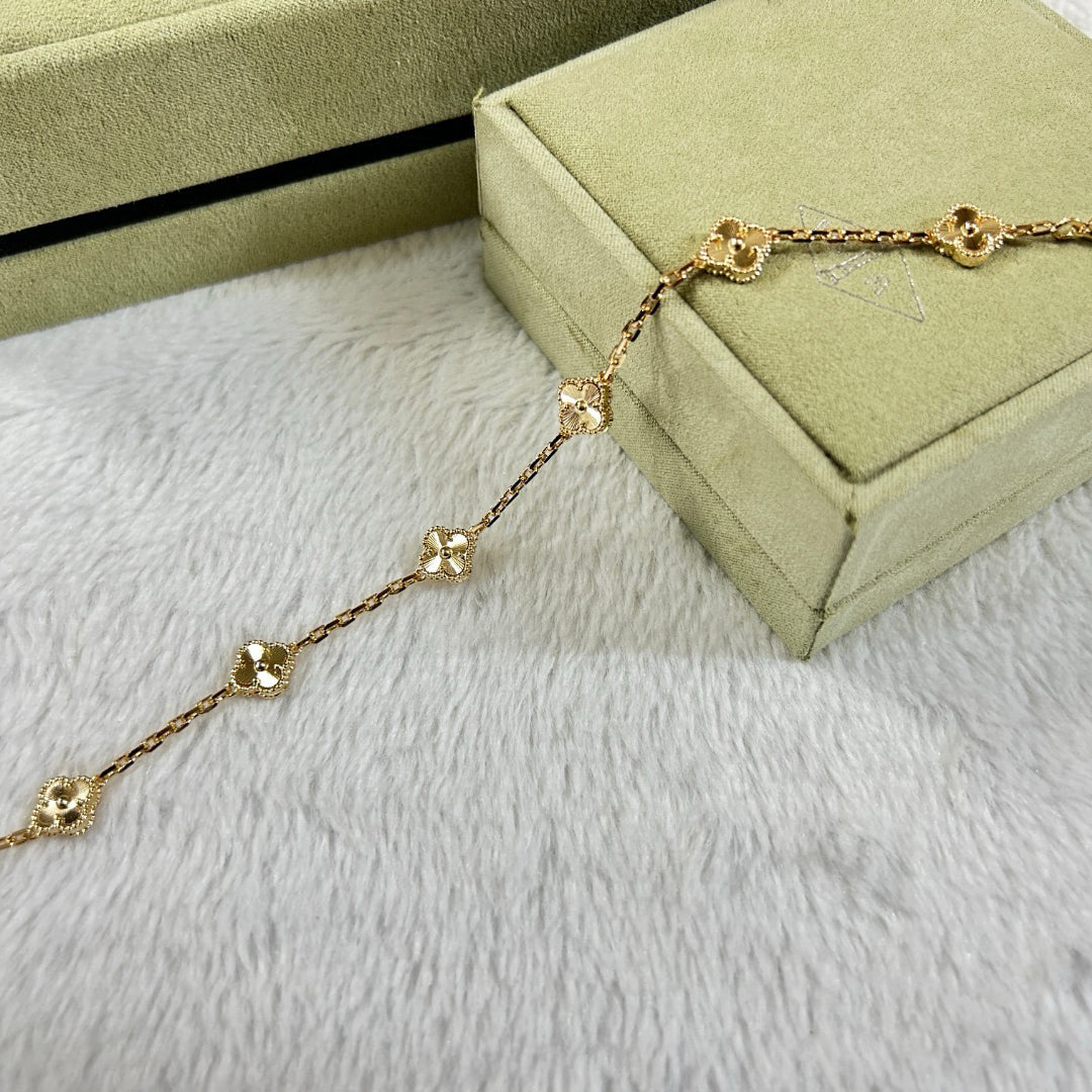 [Raffine] DIAMANTARMBAND MIT KLEEBLATT UND 6 MOTIV