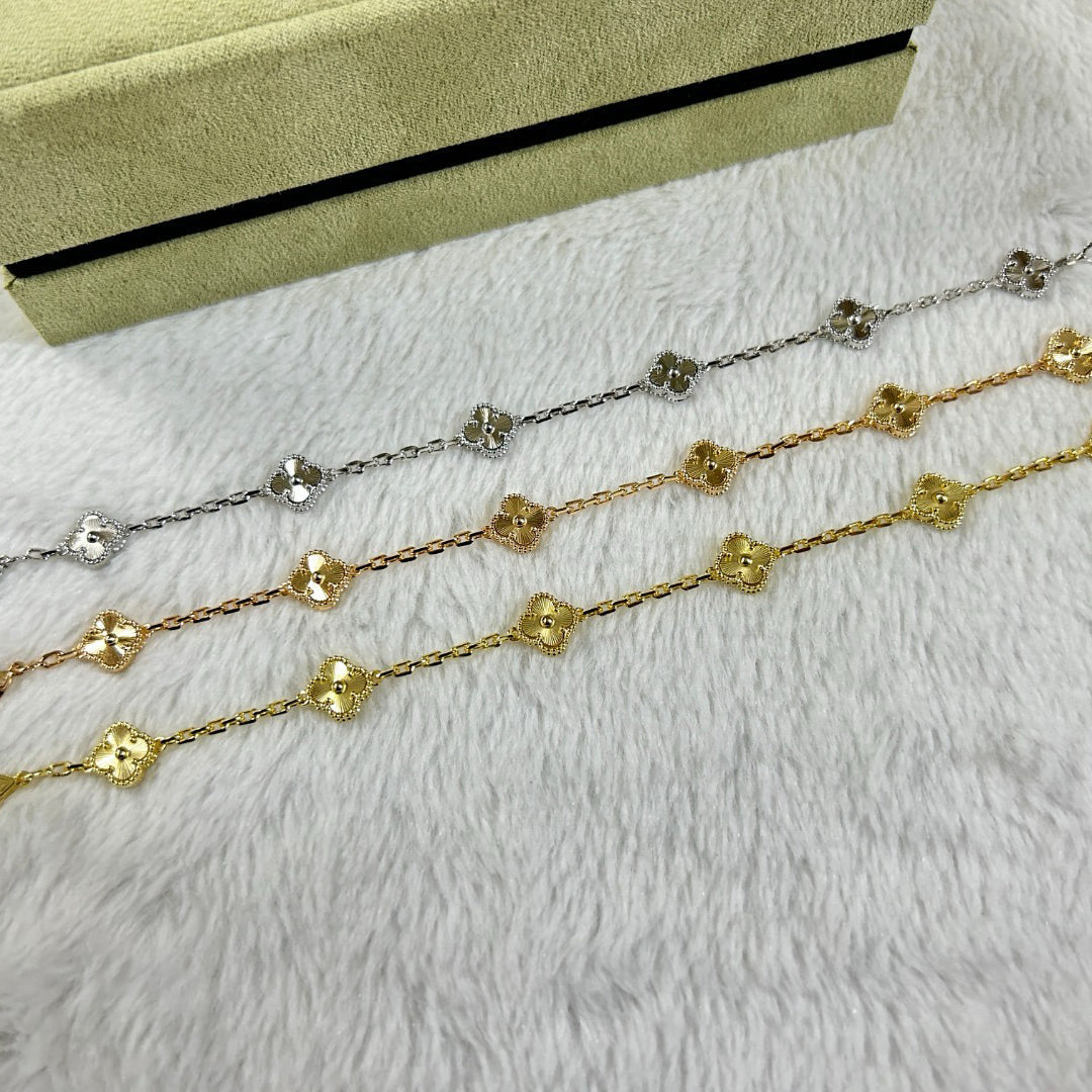 [Raffine] DIAMANTARMBAND MIT KLEEBLATT UND 6 MOTIV